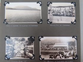 A photographic and souvenir card album containing images from the Far East, early 20th century. A