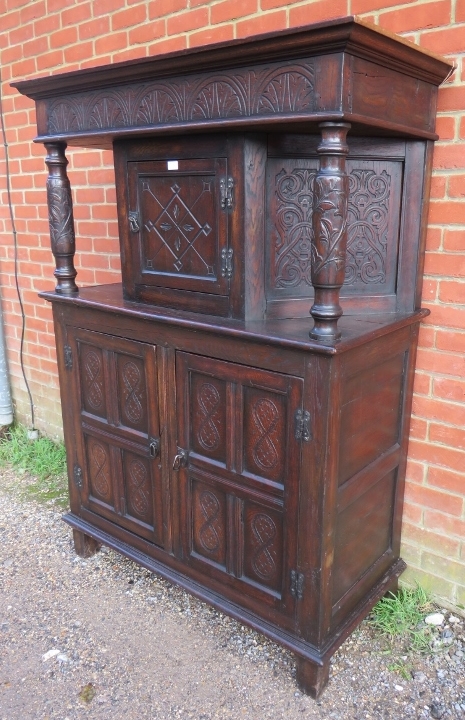 A 17th century and later oak court cupboard, the top section with central cupboard flanked by relief - Image 4 of 4