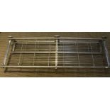 A stainless steel wall mountable double rack.