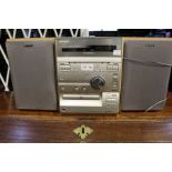 A compact "Sony" CD / Radio with a pair of stereo speakers