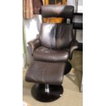 A brown leather swivel recliner chair with matching footstool