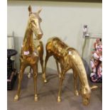 A pair of brass horses