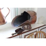 A 19th century copper coal scuttle, with shovel