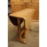 A light oak small gateleg table