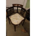 A mahogany satinwood inlaid corner chair with upholstered seat pad