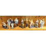 A shelf full of Oriental Tai Chi figurines