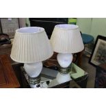 A pair of white crackle glaze "maison" table lamps with pleated shades.