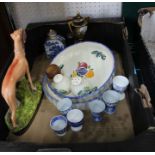 A selection of domestic pottery and porcelain including a Staffordshire greyhound.