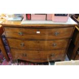 A late 19th century mahogany bow front three drawer chest.