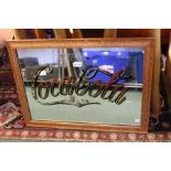 A coca cola vintage advertising mirror with mother of pearl inlay, in later frame