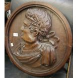 An oak roundel with profile of Roman Emperor