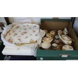 A box containing Royal Crown Derby Items and tray tea set and a selection of plates.