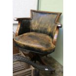 Early 20th century mahogany office swivel chair on adjustable base by Hillcrest.