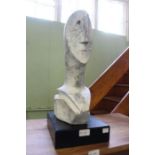 A contemporary statue head in Picasso style