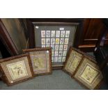 A selection of glazed & framed Oriental silks together with framed cigarette cards.