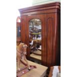 A 19th century mahogany wardrobe, single door with lined interior and draw.