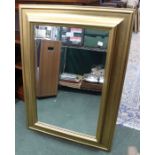 A bevel plated, deep gilt framed mirror