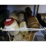 A small crate of mustard pots and tea cannisters.