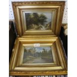 A pair of oil on board riverscapes in fancy gilt frames.