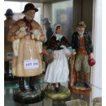 Three Royal Doulton figurines various.