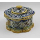 A 19th century Spanish tin glazed Faience earthenware table top inkwell
