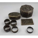 A collection of five various silver napkin rings, combined weight: 103g, together with two Eastern d