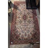 A "Prado Keshan" super pure wool woven floor rug of Persian design. 90 x 178cm