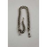 A substantial silver watch chain, graduated links, with "T" bar and two clips, 110g