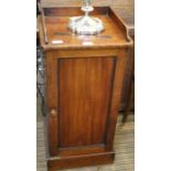 A Victorian plain bedside cupboard with three quarter upstand and plinth base.
