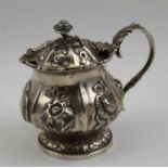 William Bateman II, a William IV silver lidded mustard pot, lobed hexagonal form with repousse flora