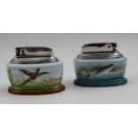 Two Minton table lighters, one decorated with a pheasant in flight, signed T.Lee, the other a leapin