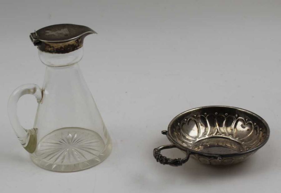 J & J Maxfield Ltd. An Edwardian silver mounted glass whisky noggin, Birmingham 1907, with handle an