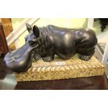 A bronze Hippopotamus on marble base, size of base 36cm x 19cm