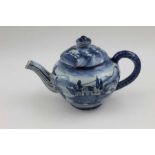 An Italian Cantagalli Majolica pottery bachelor teapot, blue painted landscape decoration in the rou