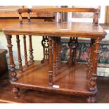 A Victorian unusual design walnut topped Canterbury. 48 cm high excluding gallery.