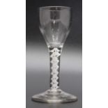 An 18th century opaque twist cordial glass circa 1765