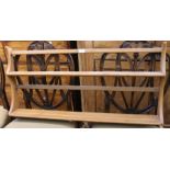 An Elm twin shelved hanging plate rack in the manner of Ercol. 96.5 cm width.