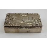 A William IV silver snuff box, the hinged cover decorated with a raised image of a grand country hou
