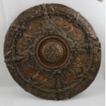 A late 19th century electrotype embossed circular plaque, Classical decoration, in the manner of Elk