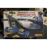 A Matchbox power track race and chase car game in original box.