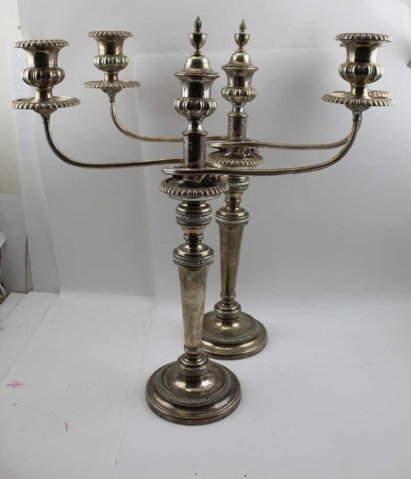 A pair of silver plated table candelabra, removable fitted twin branch mounts, Georgian design, 53cm