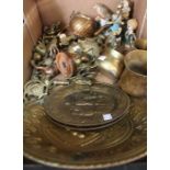 A box of assorted brass wares.
