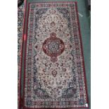 A hearth rug with busy floral centre with triple guard border, maroon background