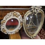 A pair of fancy framed gilt mirrors