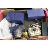 A box containing domestic metalwares to include cutlery, goblets & three modern wris