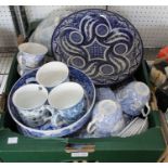 A quantity of blue & white ceramic wares, includes bowls, meat dishes, etc.