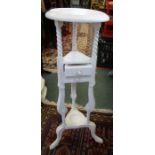 A white painted plant stand