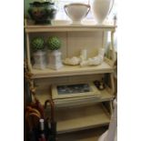 A white waterfall bookcase