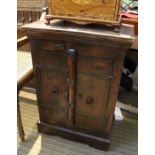 A possibly Indian hardwood two door side cabinet. 70 x 50 cm.