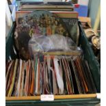 A box of LP records and singles various.